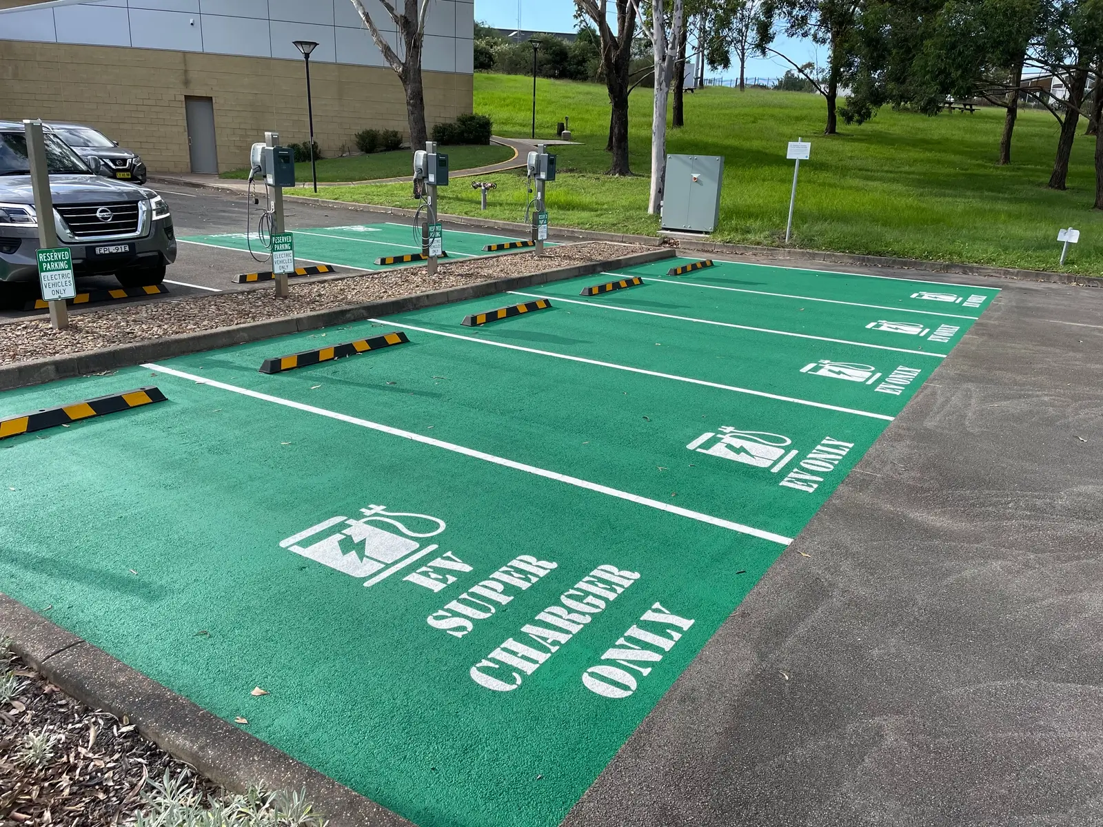 Electric vehicle charging station custom line marking stencil